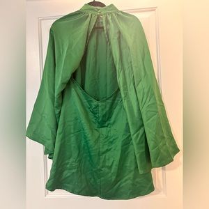 A green long sleeve short dress